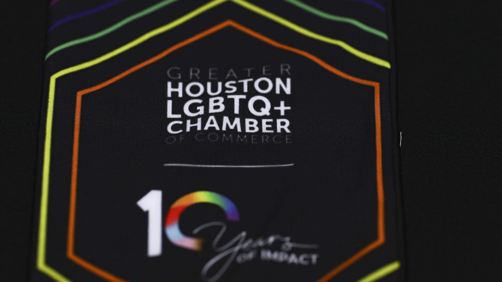 The Greater Houston LGBTQ+ Chamber of Commerce logo displayed at Shell Energy Stadium.