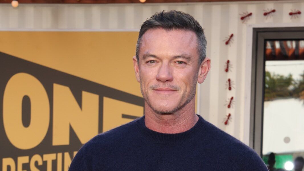 Luke Evans wearing a navy sweater at the 2026 MIPCOM ITV photocall in Cannes