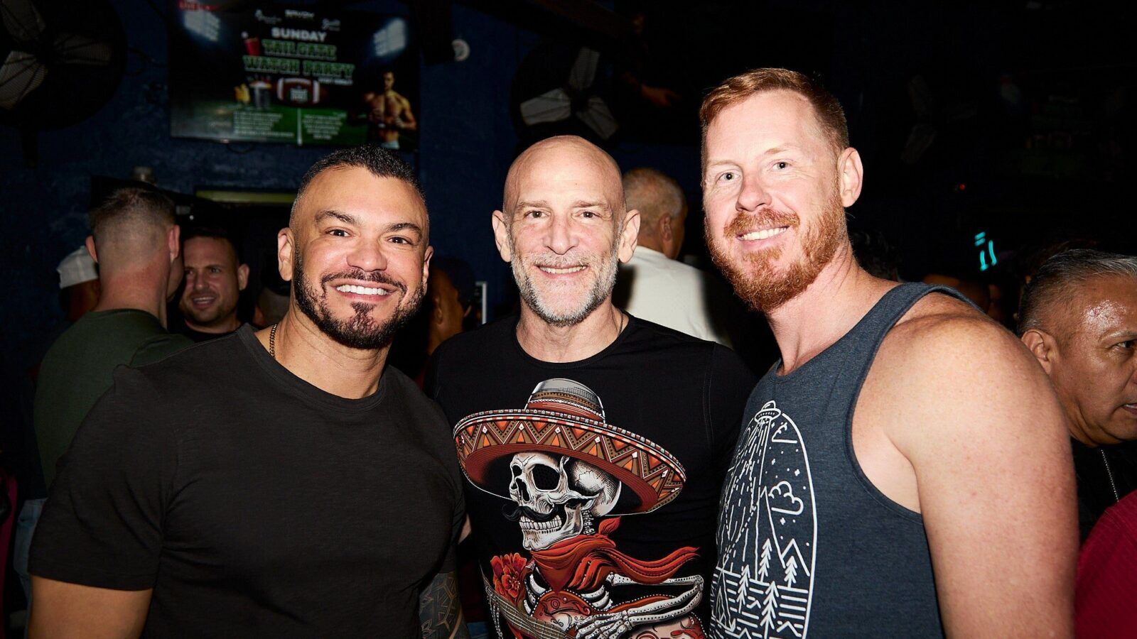 Three patrons pose together inside Savoy Orlando.