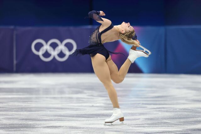 Amber Glenn of the U.S. team competes in the women's single skating free skate during the second day of the 2026 Milan-Cortina Winter Olympics at the Milan Ice Skating Arena on February 8, 2026 in Milan, Italy. 
