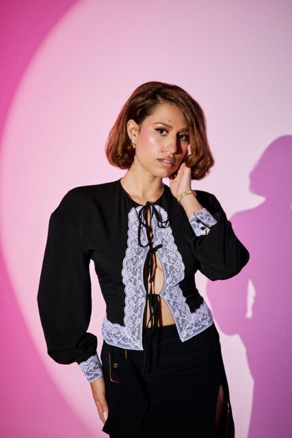 RAYE reveals the emotional toll of her new album, her break from the label system, and creative freedom in a candid Apple Music interview.