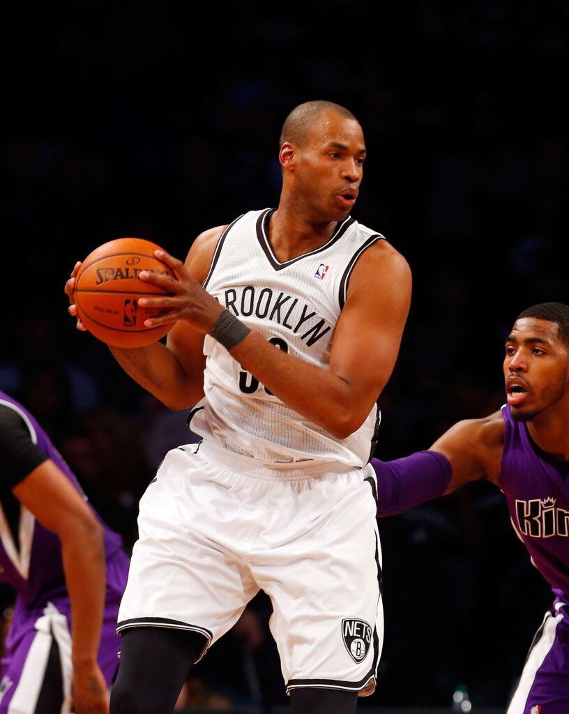 NEW YORK, NY - MARCH 09: (NEW YORK DAILIES OUT) Jason Collins #98 of the Brooklyn Nets in action against the Sacramento Kings at Barclays Center on March 9, 2014 in the Brooklyn borough of New York City.The Nets defeated the Kings 104-89. NOTE TO USER: User expressly acknowledges and agrees that, by downloading and/or using this Photograph, user is consenting to the terms and conditions of the Getty Images License Agreement. (Photo by Jim McIsaac/Getty Images)

