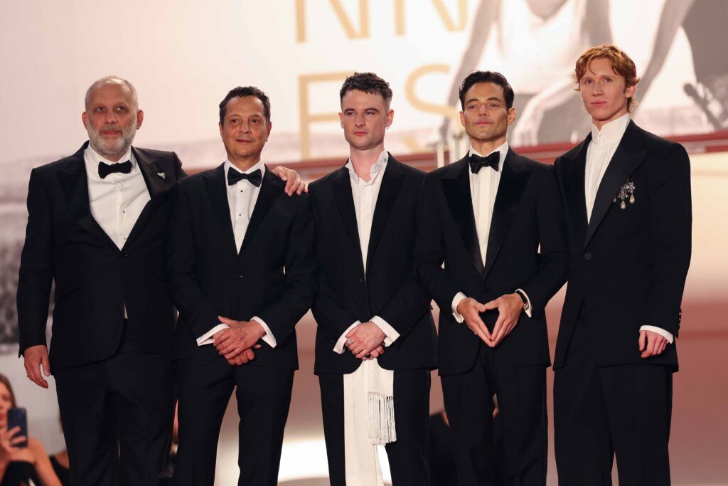 CANNES, FRANCE - MAY 20: (L-R) Ira Sachs, Mauricio Zacharias, Tom Sturridge, Rami Malek and Luther Ford attend the "The Man I Love" screening during the 79th annual Cannes Film Festival at Palais des Festivals on May 20, 2026 in Cannes, France. (Photo by Aurore Marechal/Getty Images)