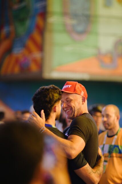 Participants share a kiss at MPact Global Action’s Besoton Sidoso Internacional / International HIV Kiss-In