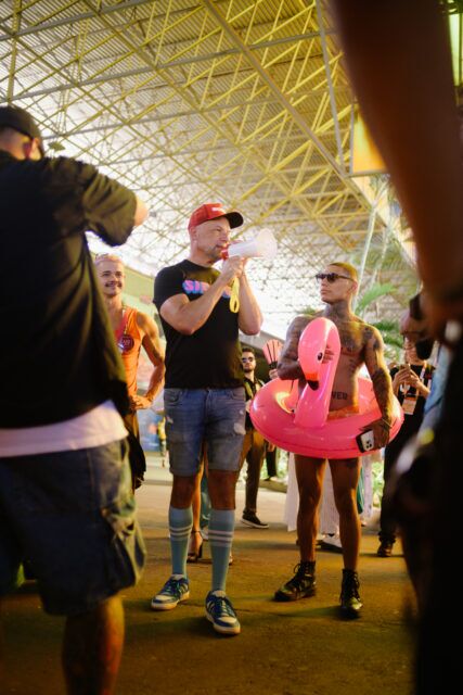 Alex Garner, Managing Director of Mpact Global, mobilizing participants at MPact Global Action’s Besoton Sidoso Internacional / International HIV Kiss-In