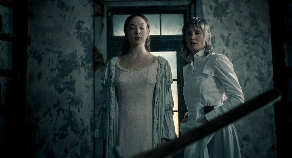 Monster: The Lizzie Borden Story. (L to R) Ella Beatty as Lizzie Borden, Vicky Krieps as Maggie Sullivan in episode 402 of Monster: The Lizzie Borden Story. Cr. Courtesy of Netflix © 2026